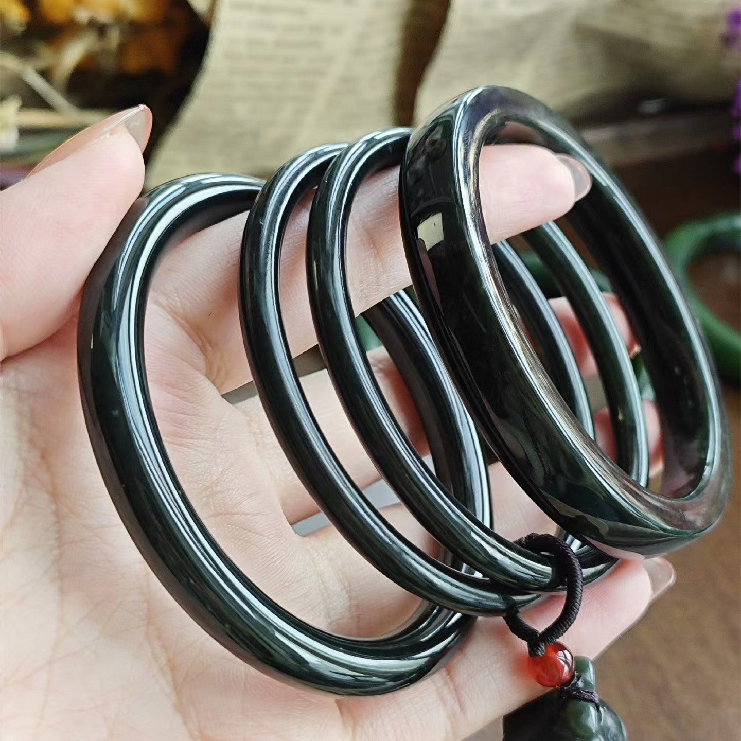 Wholesale 55-65mm certified dark green black chubby round nephrite Hetian jade bangles